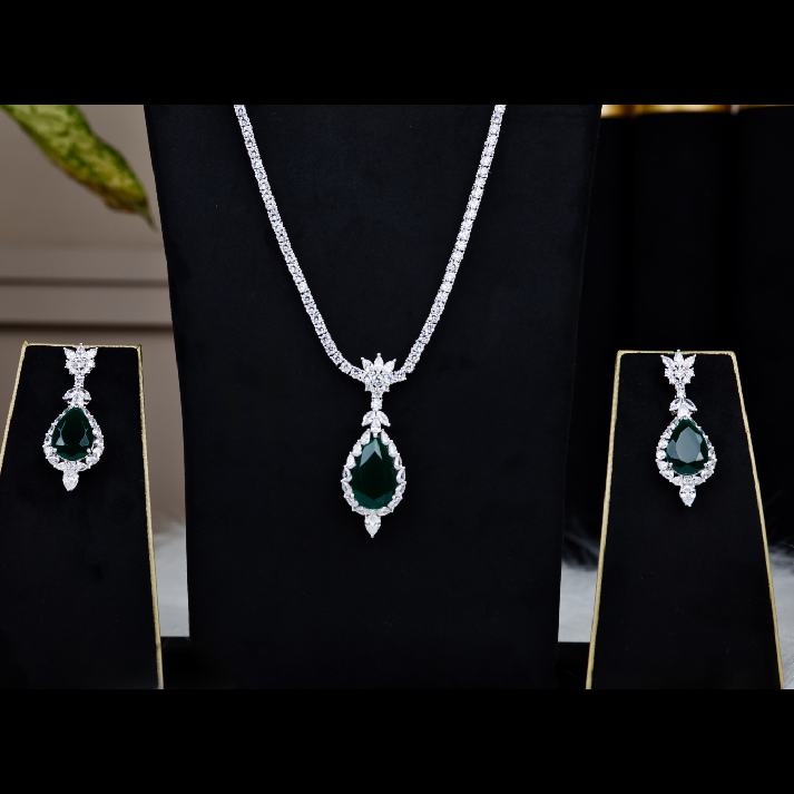 Sophisticated Emerald-Green & Silver Diamond-Halo Pendant Set