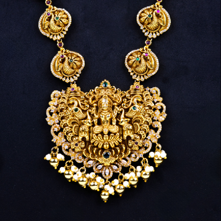 Grand Antique Gold Temple Haram Set with Divine Lakshmi & Peacock Motifs
