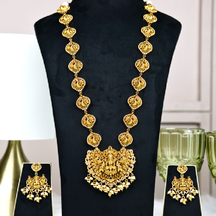 Grand Antique Gold Temple Haram Set with Divine Lakshmi & Peacock Motifs