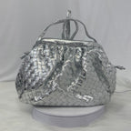 Silver Gleam Woven Clutch