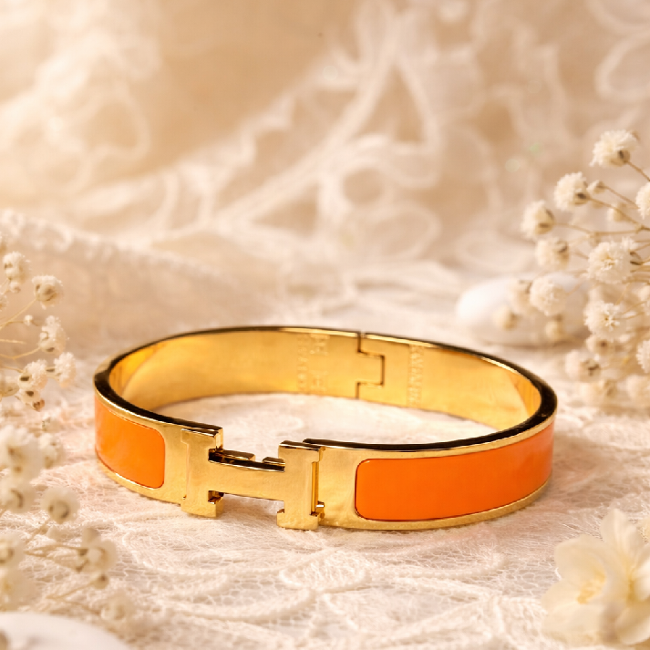 Noore by Neetu Kaushal Orange Enamel Gold Bracelet for Girls