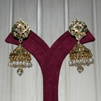 Classic Kundan Pearl Jhumka Earrings with Green Accents