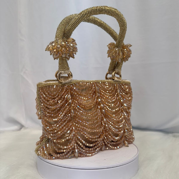 Golden Cascade Potli – By Noore