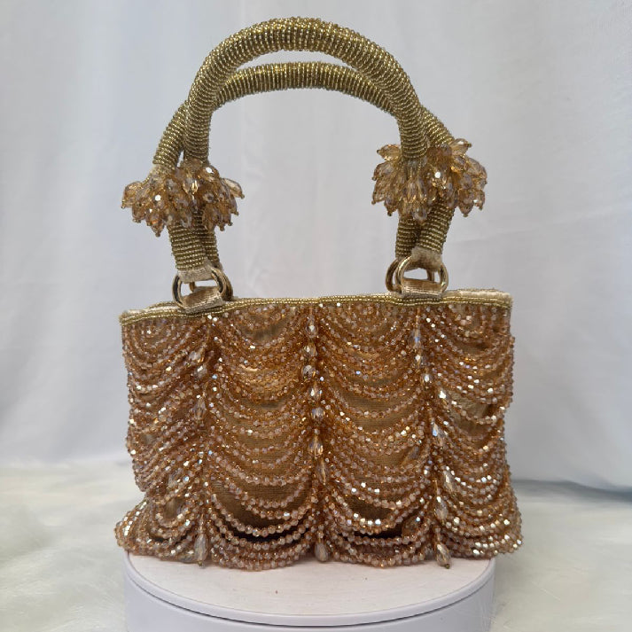 Golden Cascade Potli – By Noore